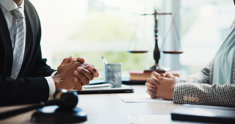 Meeting with law firm for debt settlement negotiation