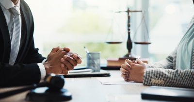 Meeting with law firm for debt settlement negotiation